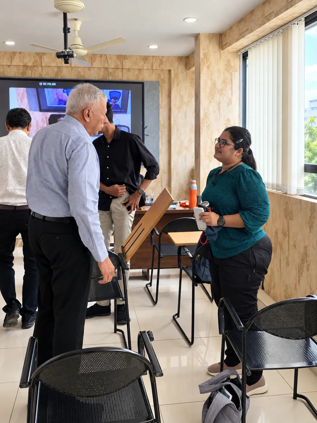 Faculty interacting with students at Vajra Aviation